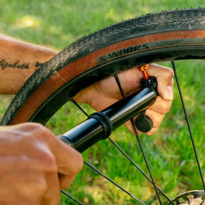 WOLF TOOTH EnCase Pump85 with Tubeless Tire Plug Tool - Sticky Bottle